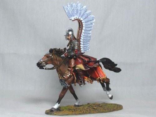 Geflügelter Husar greift mit Schwert an