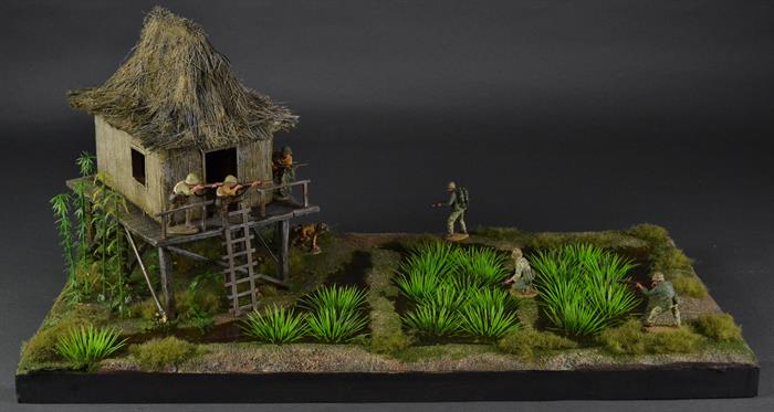 Junglehytte omgivet af rismarker - diorama