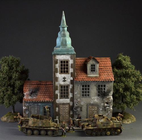 European city with spires and cobblestone street - Diorama