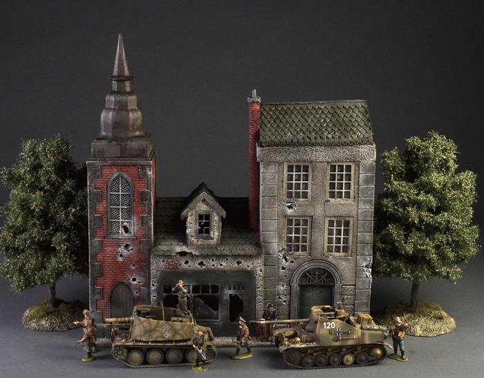 European city with spires and cobblestone street - Diorama