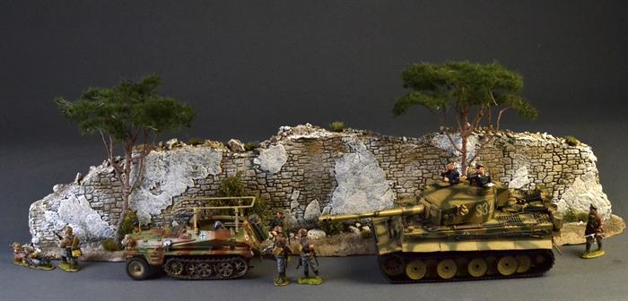 Old stone wall with majestic Pinja trees