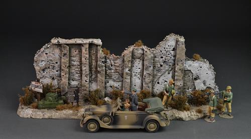 Tobruk - North African stone wall with dry bushes and grass